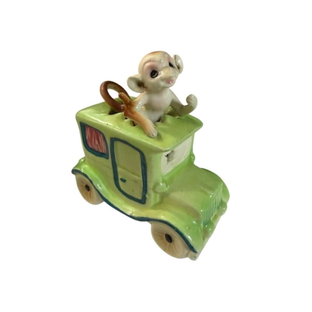 Rare Napco Japan Monkey Busting out of the Top of a Green Car Figurine